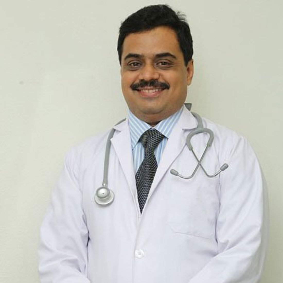 Dr. Ashutosh Shah, plastic surgeon at Elegance Clinic, Surat